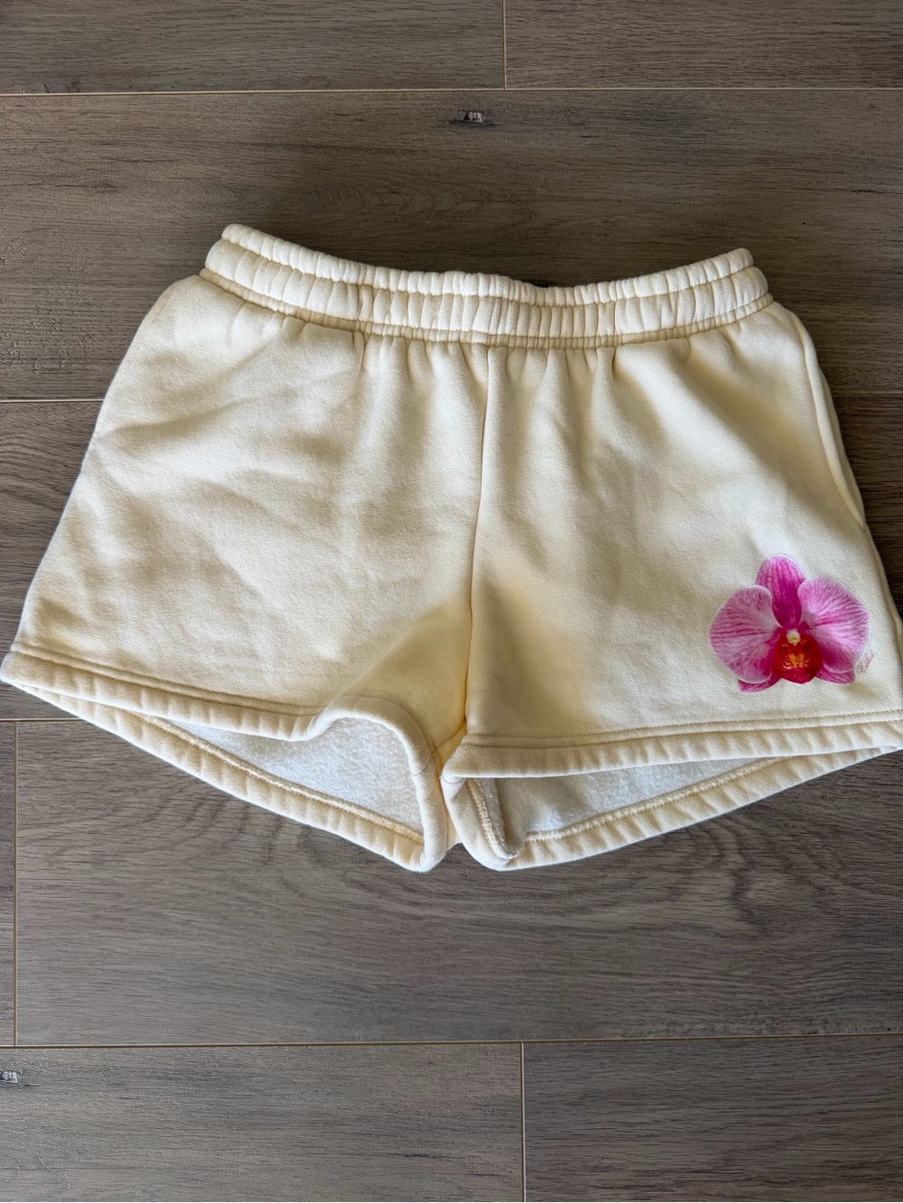 Edikted Cream Athletic Shorts with Pink Orchid Accent